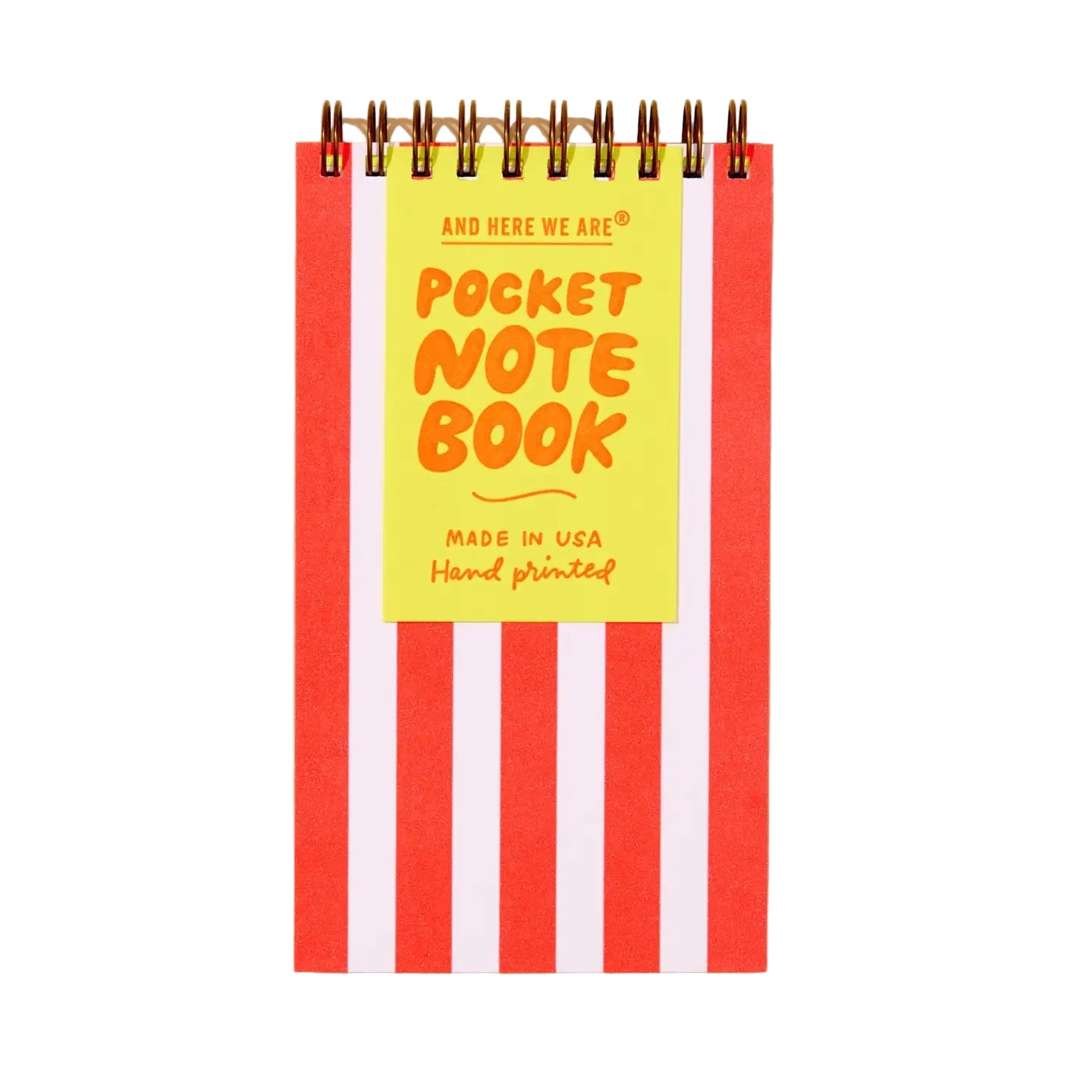 Pocket notebook with red and white striped cover and yellow label on a beige background