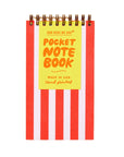 Pocket notebook with red and white striped cover and yellow label on a beige background