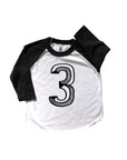 Baseball tee white with black sleeves screen printed with black number 3.