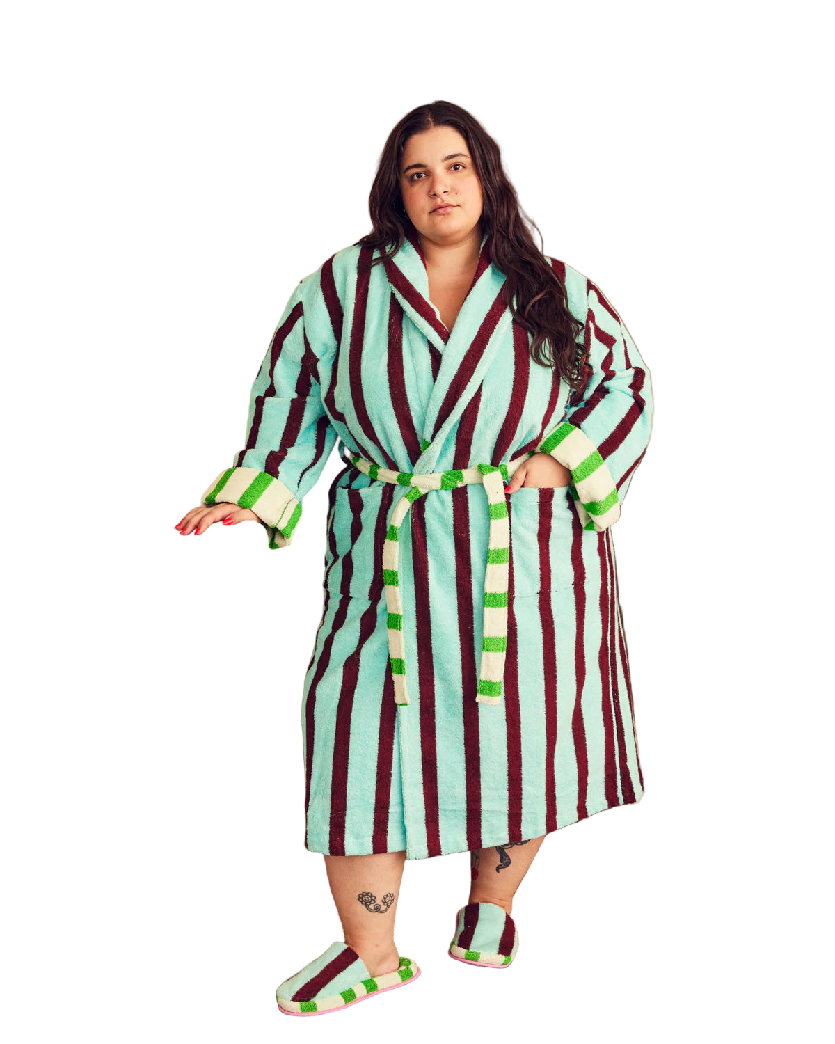 Woman wearing a teal and maroon stripe robe.